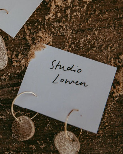 Gold Sun Disc Leather Earrings