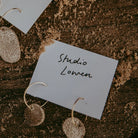 Gold Sun Disc Leather Earrings