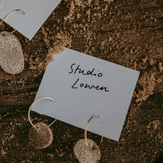 Gold Sun Disc Leather Earrings