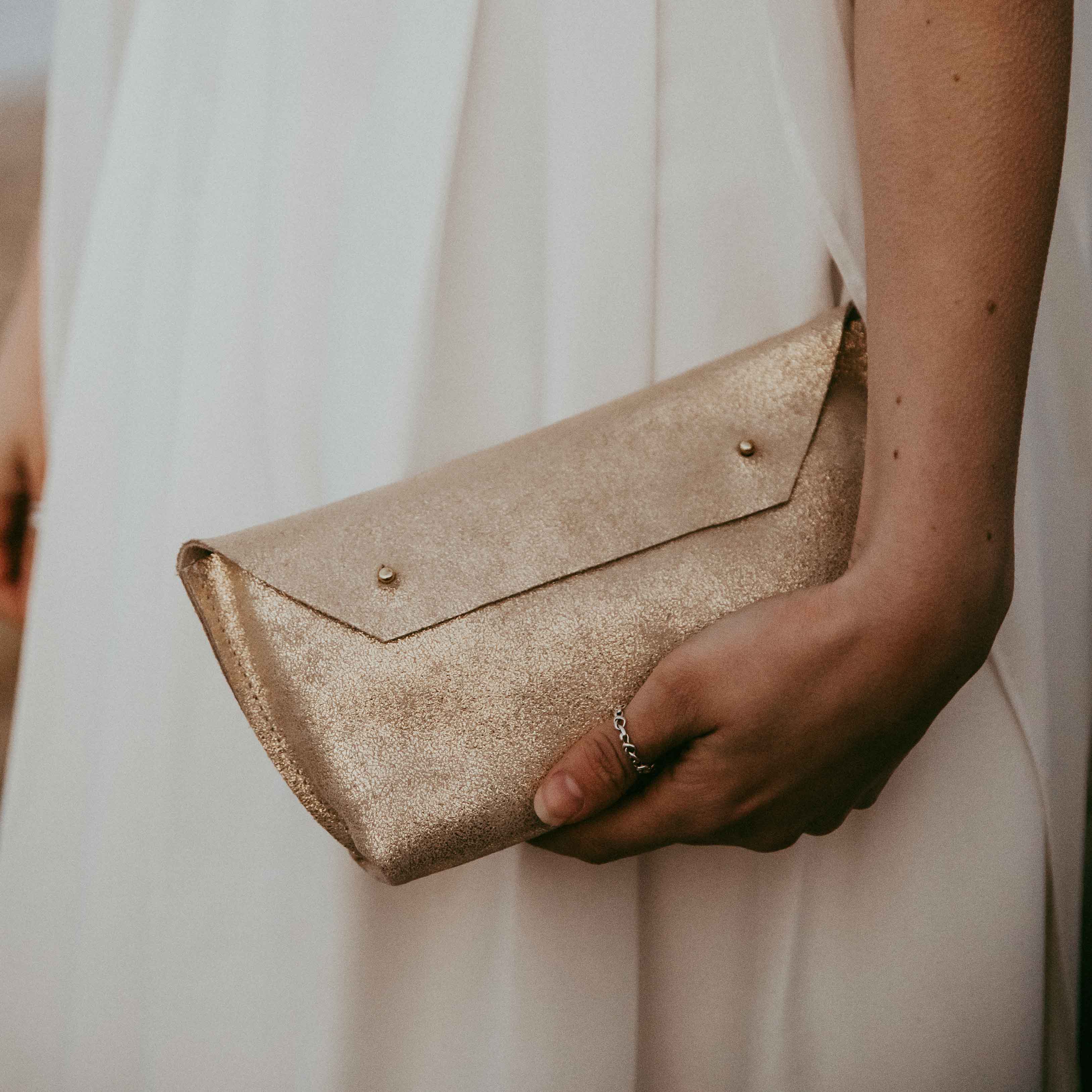 Gold Leather Ailla clutch bag