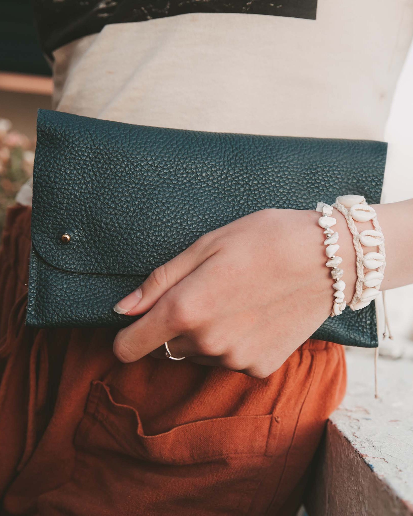Atlantic teal leather clutch bag