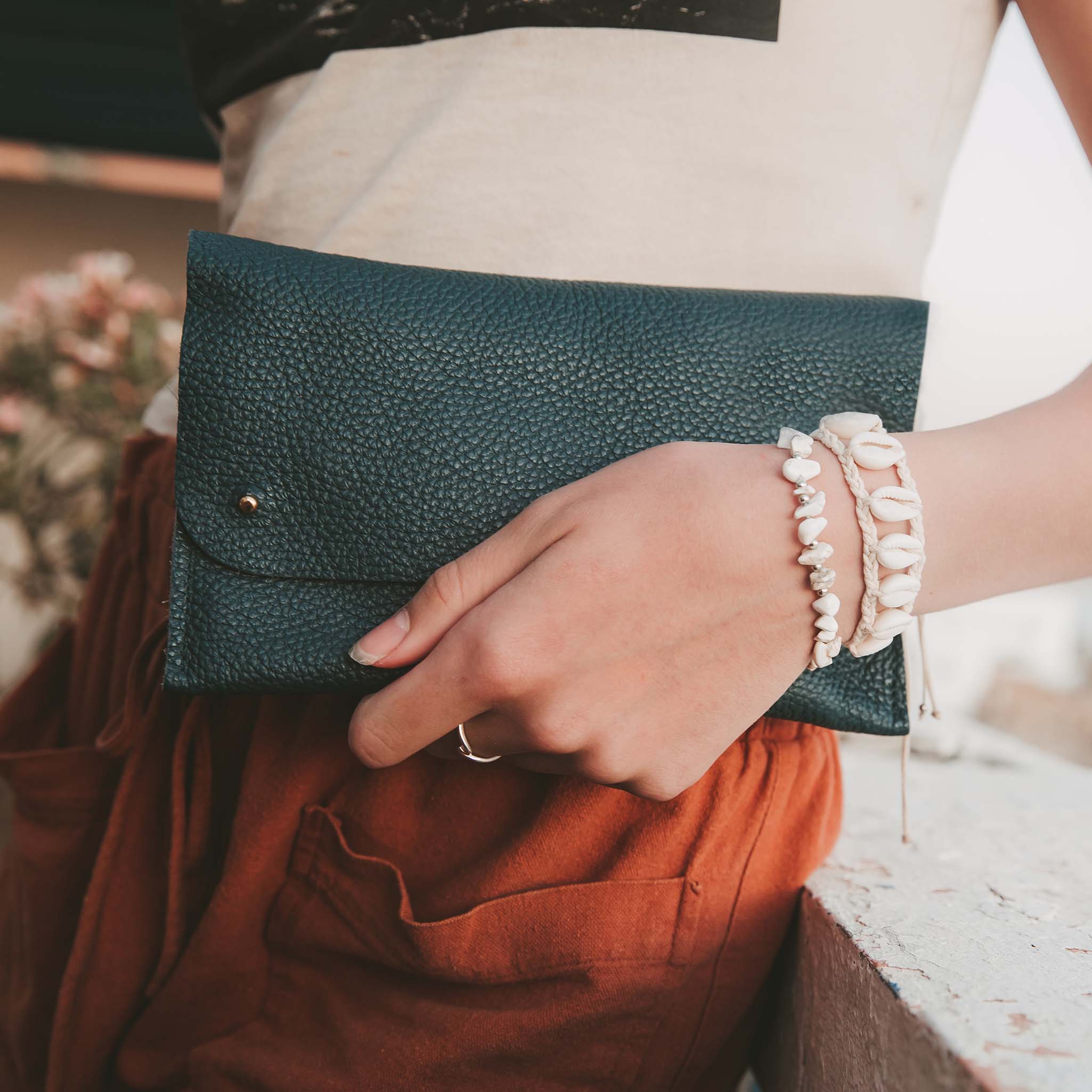 Atlantic teal leather clutch bag