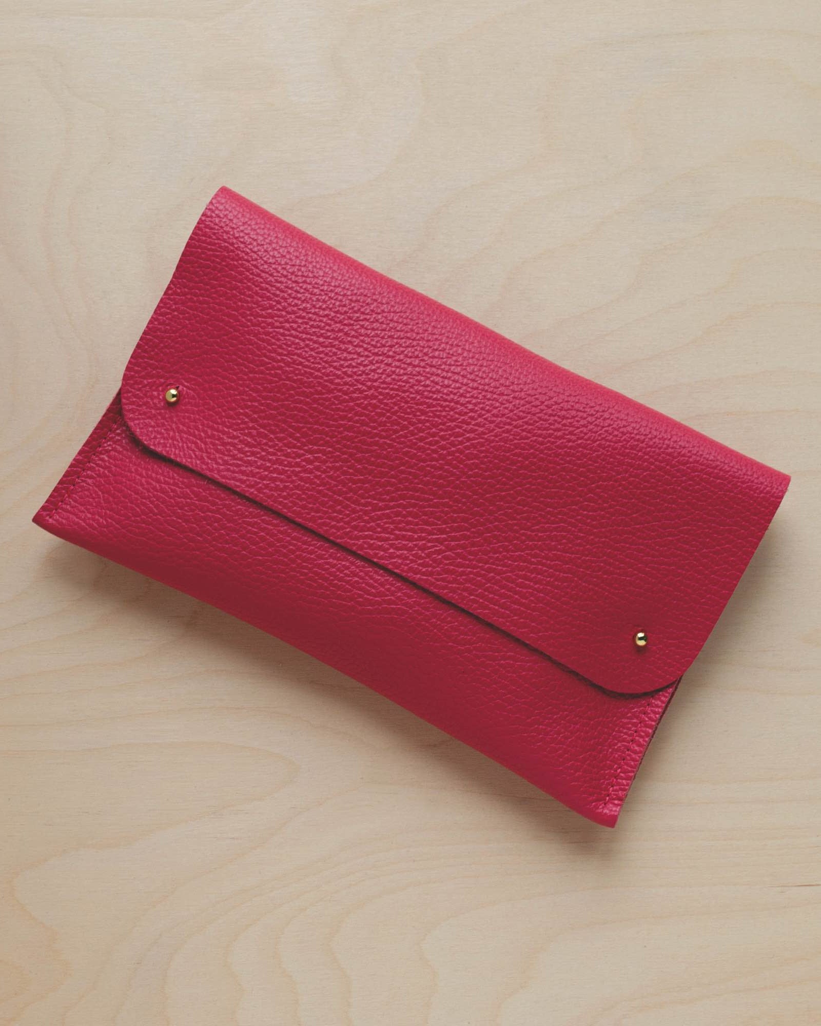 Raspberry pink leather clutch bag