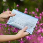 Leather clutch bag in metallic diamond