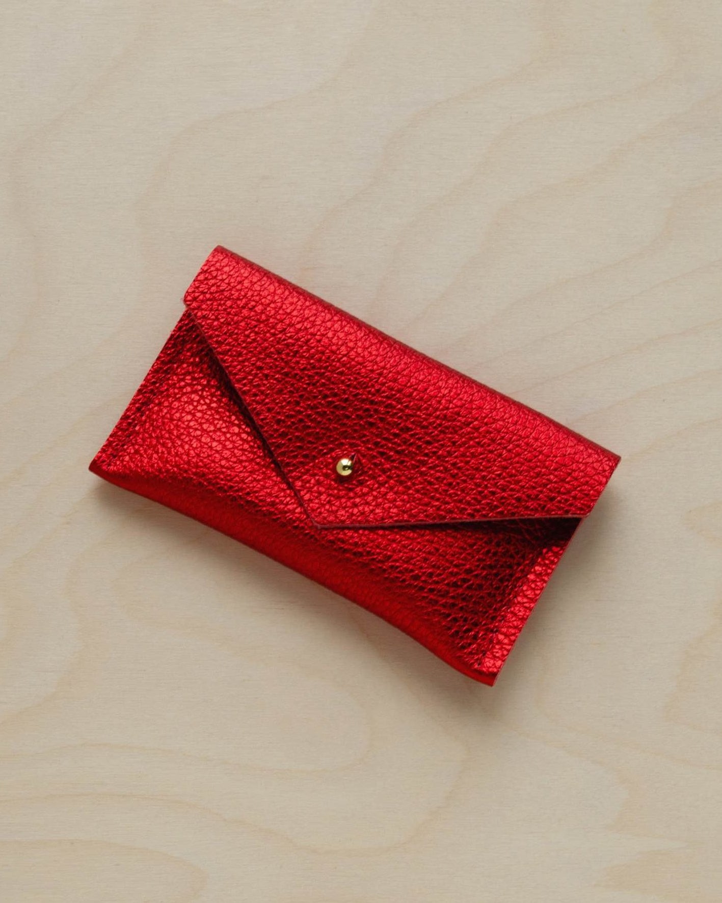 Metallic Red leather card holder.