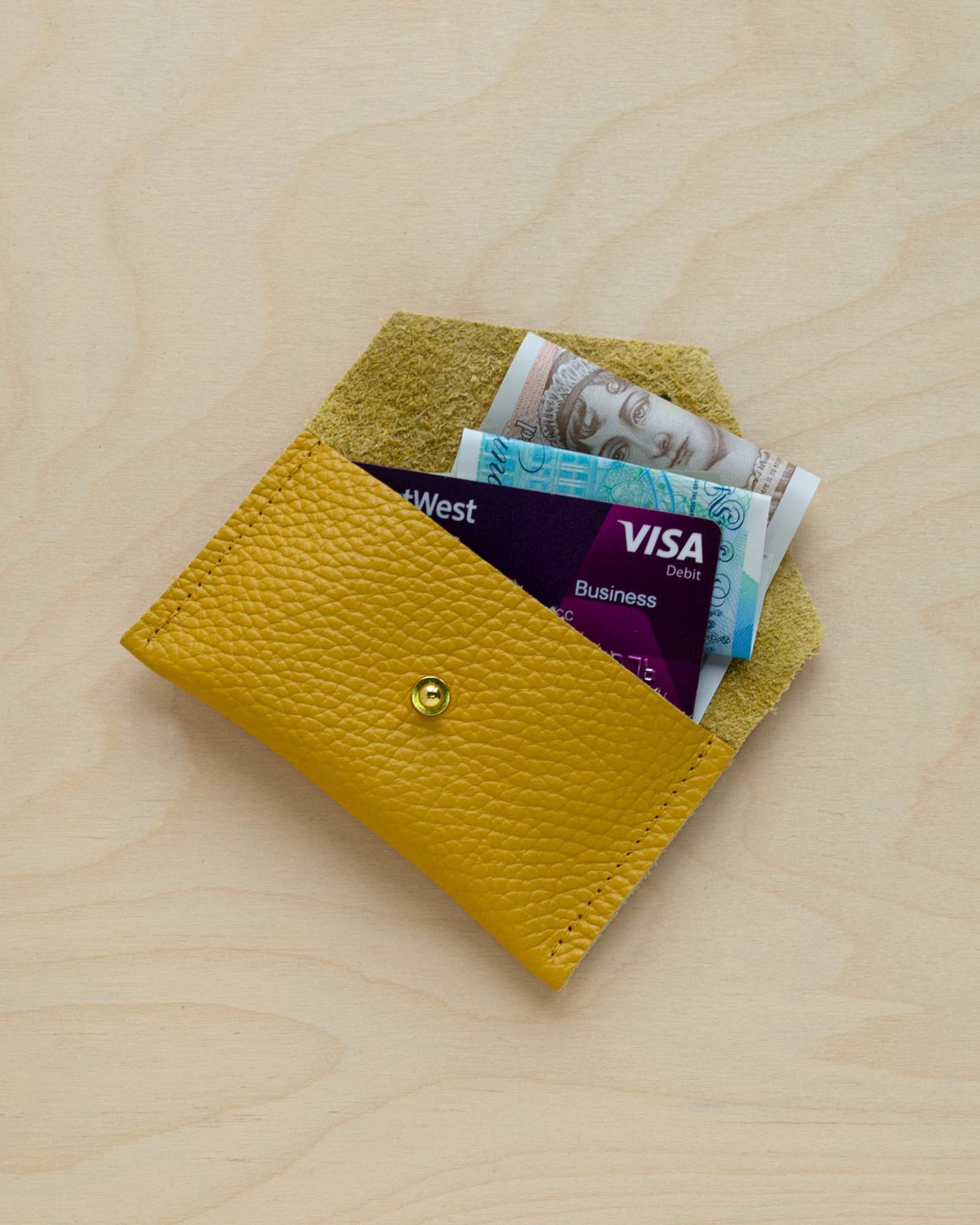Mustard Yellow card holder in use.