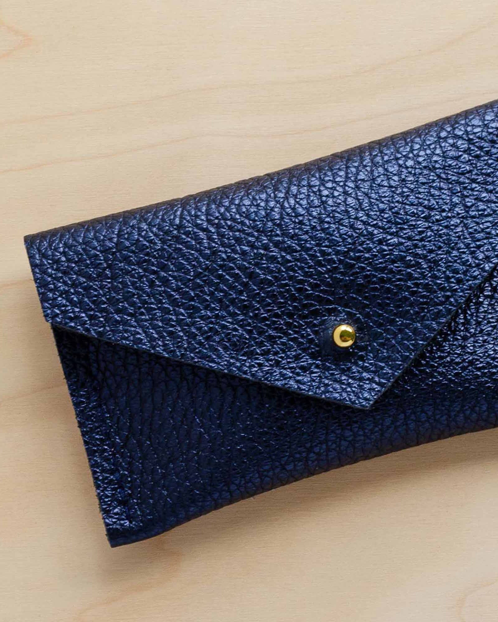 Metallic Navy Leather card holder.