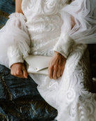 Pearlescent Ivory White Bridal Clutch Bag made with patent leather in a simple, minimalist envelope design.