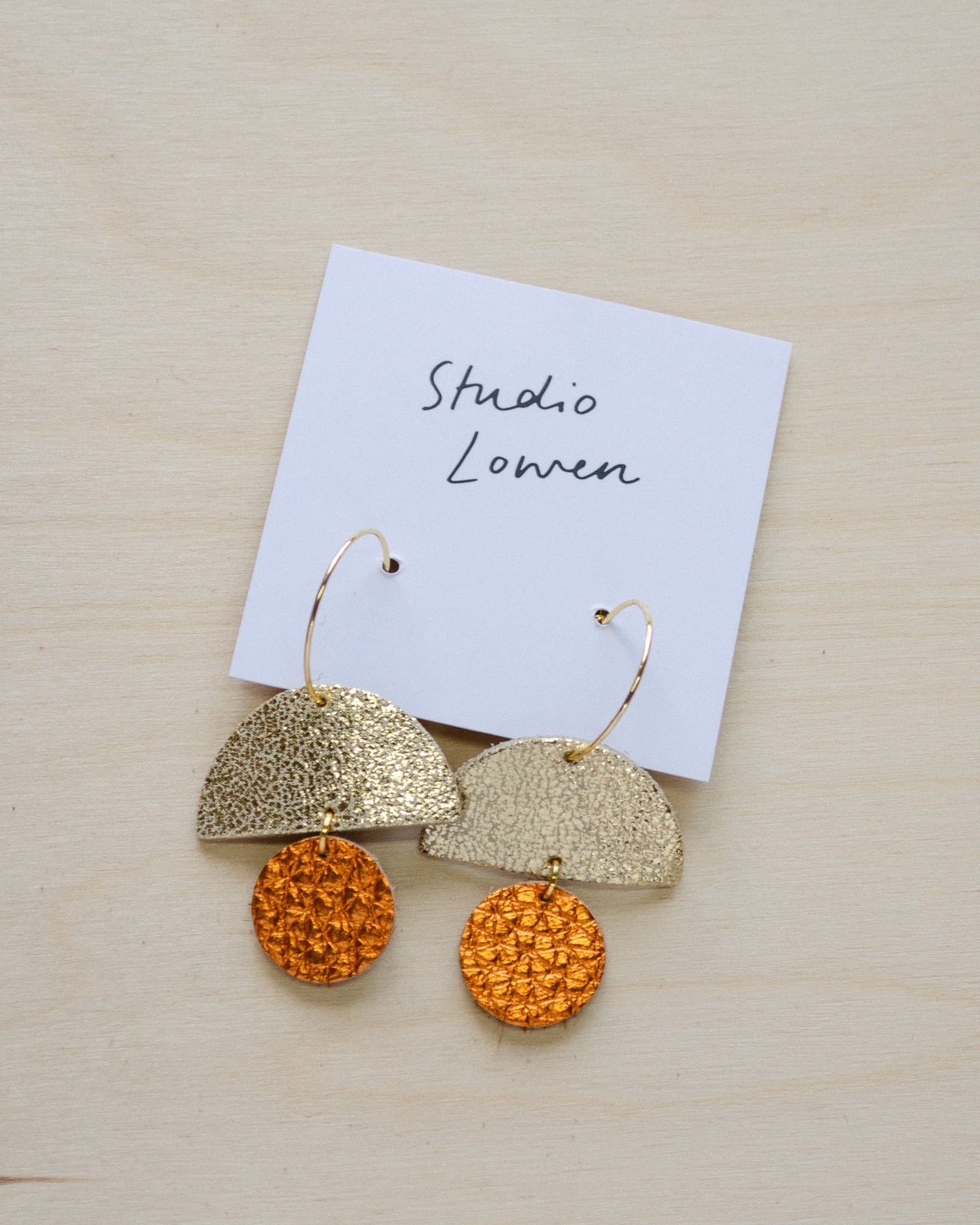 Sunrise hoop earrings in metallic copper