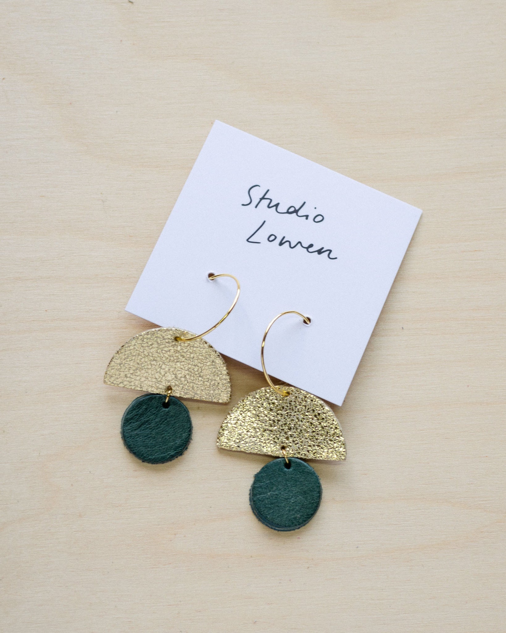 Sunrise hoop earrings in forest green leather