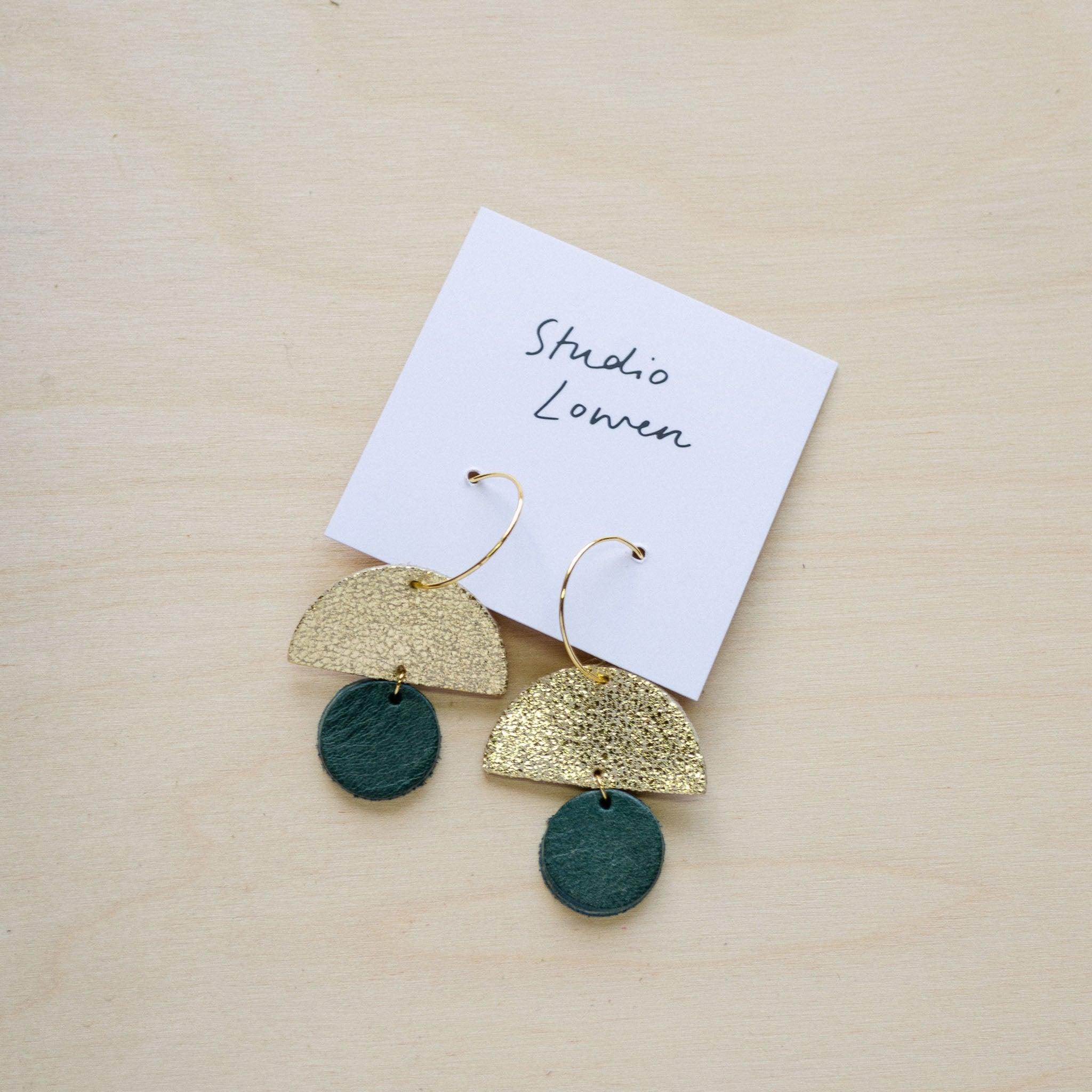 Sunrise hoop earrings in forest green leather