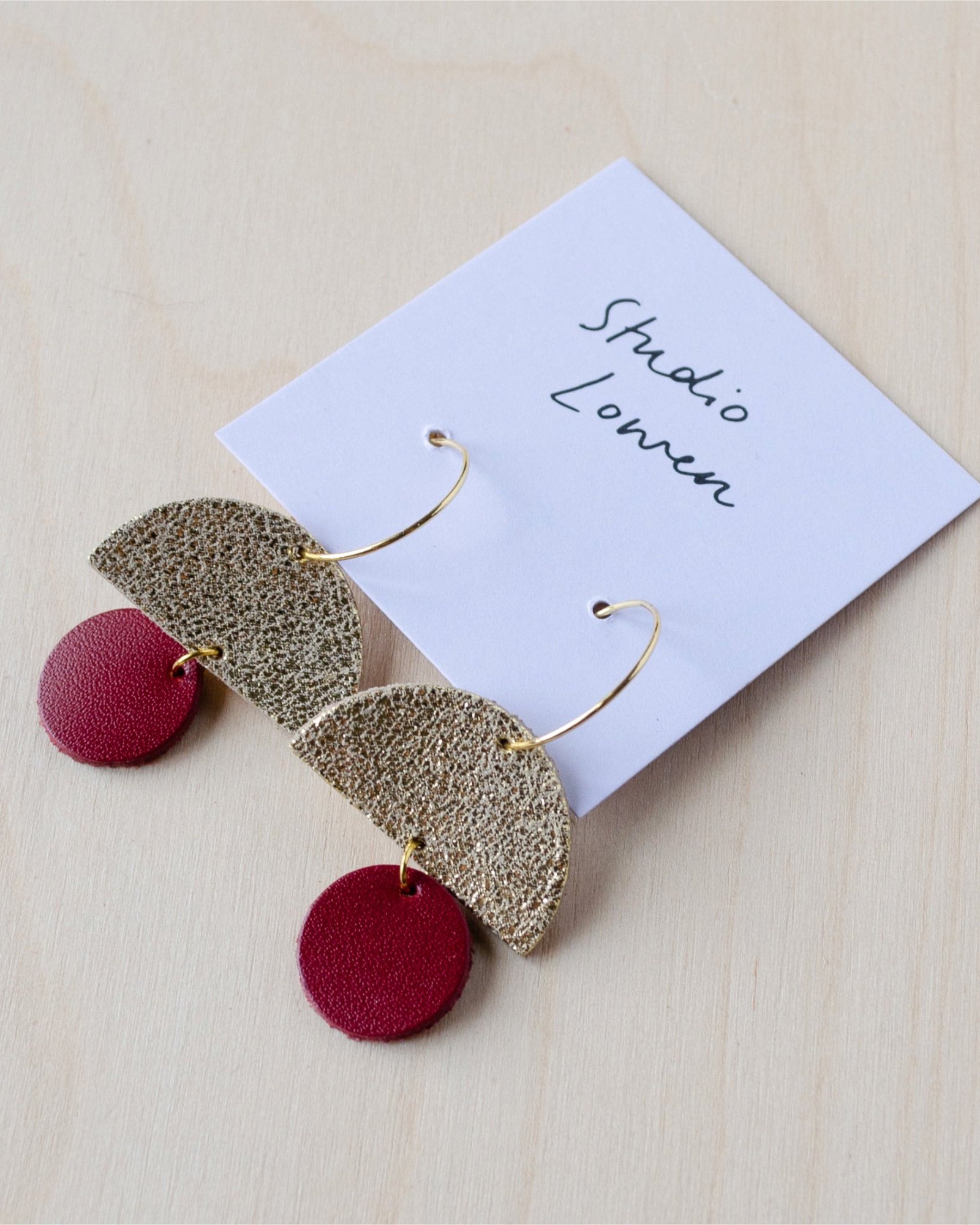 Sunrise hoop earrings in red wine leather