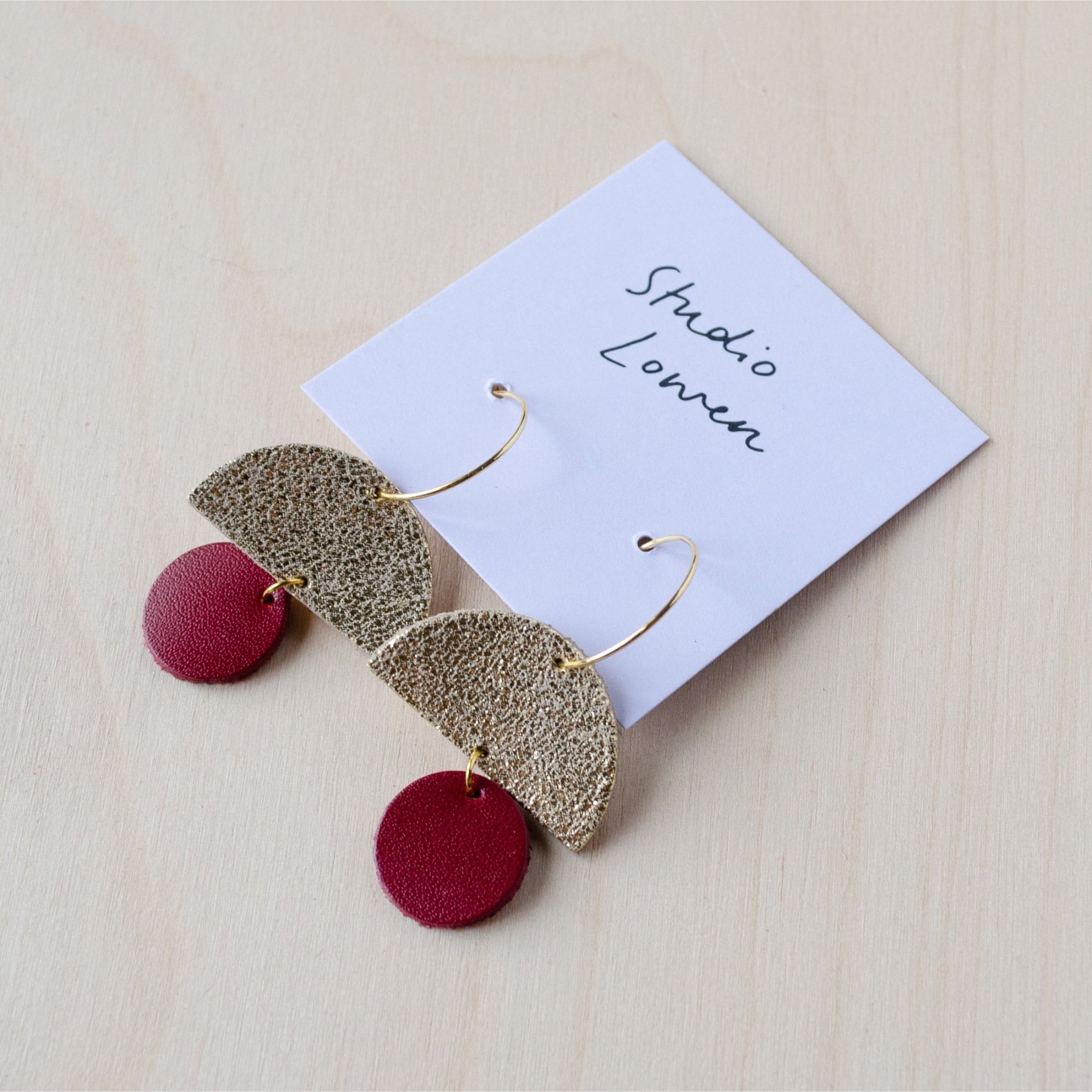 Sunrise hoop earrings in red wine leather