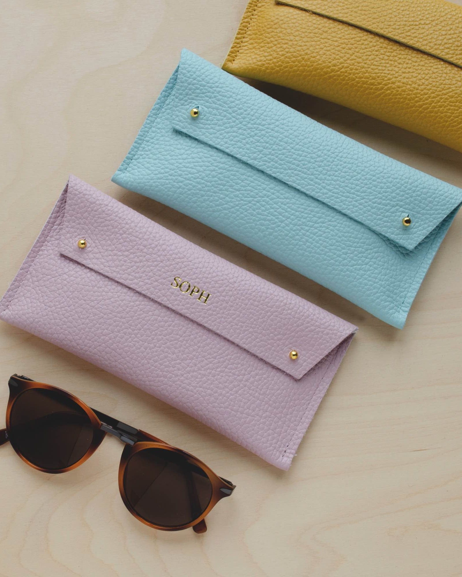 The Double Stud Glasses Case in Baby Pink, Powder Blue, Mustard Yellow. Personalised glasses case.