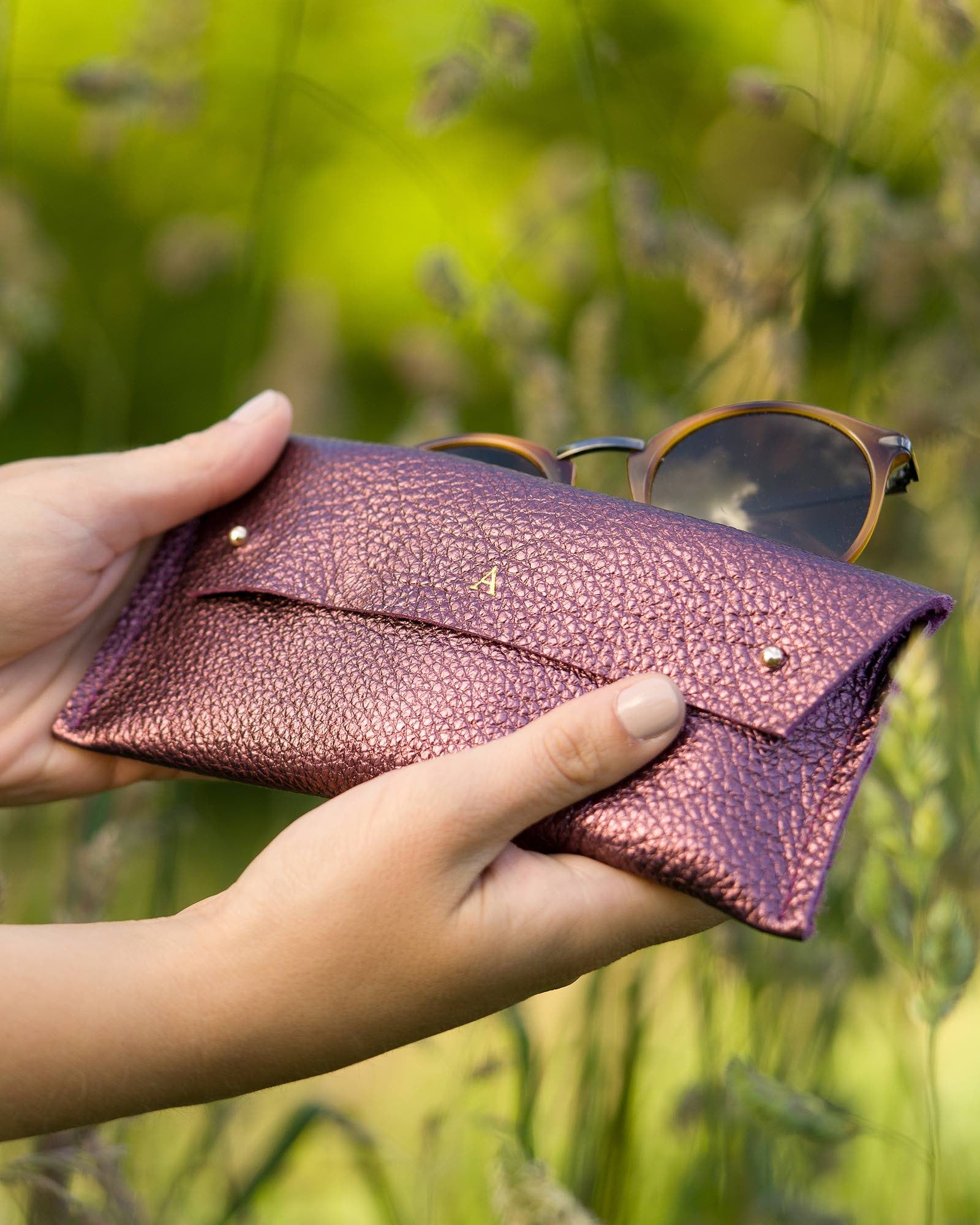 Metallic Berry leather double stud glasses case with sunglasses