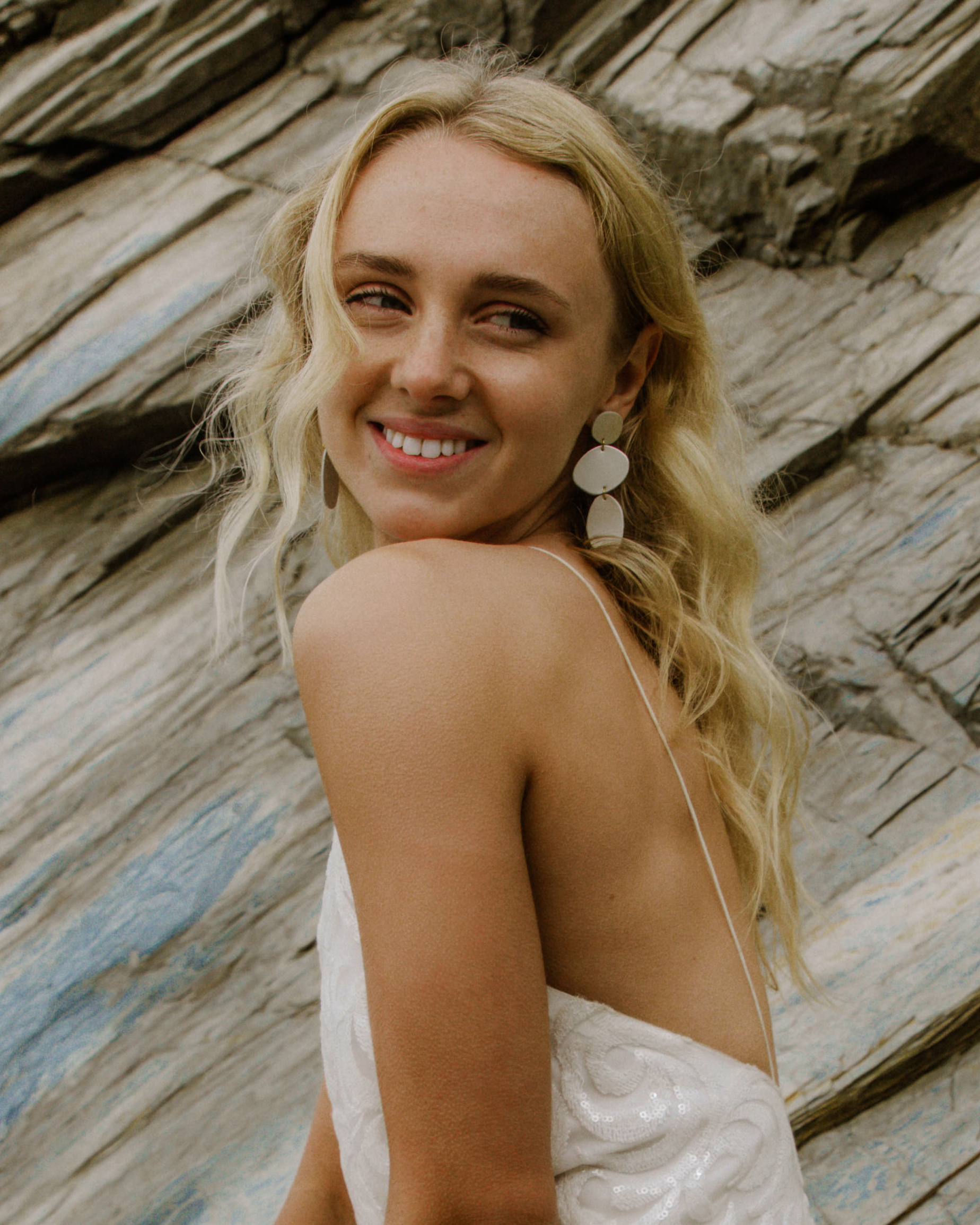 Statement Pearl White Bridal Earrings worn by bride at a coastal, beach wedding.
