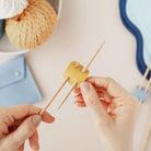 Yellow leather knitting needle holder