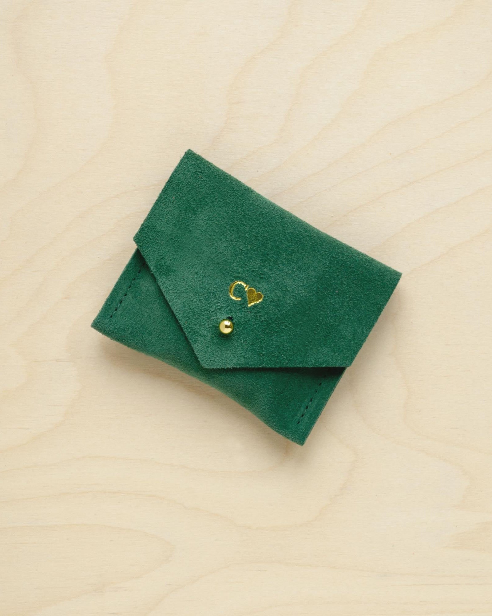 A suede Stitch Markers pouch in  Moss Green. Complete with a stud for secure closing. This pouch has been personalised with initial and love heart.