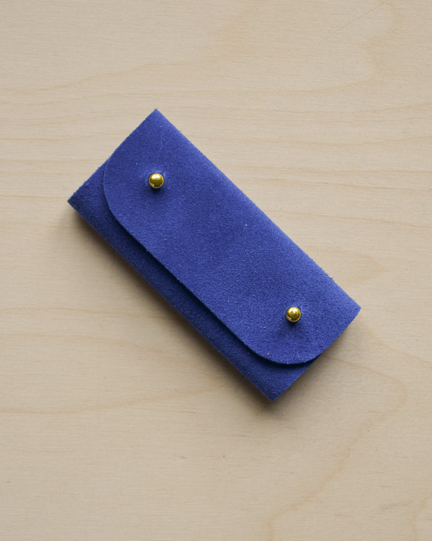 Ultramarine blue sewing needle case.
