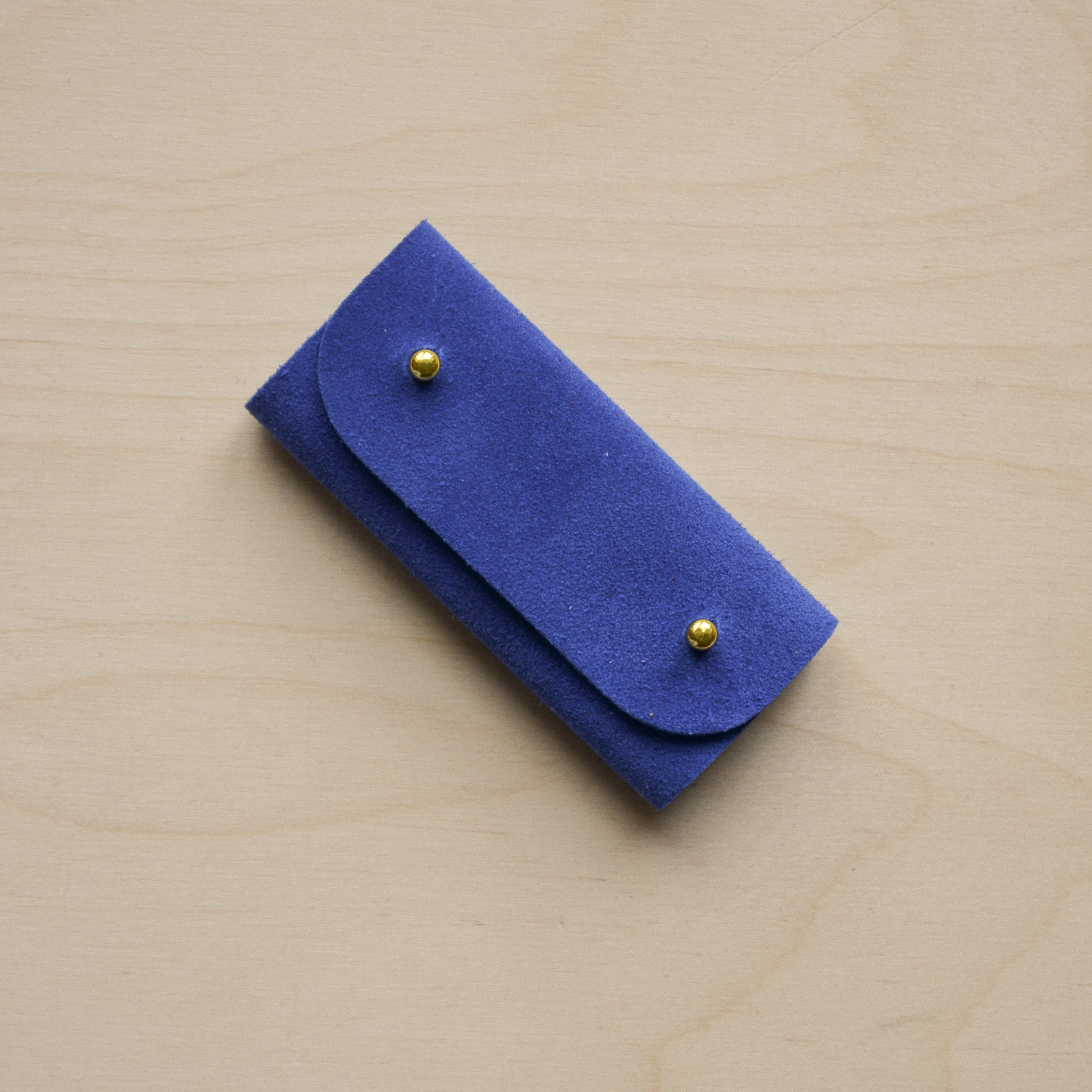 Ultramarine blue sewing needle case.