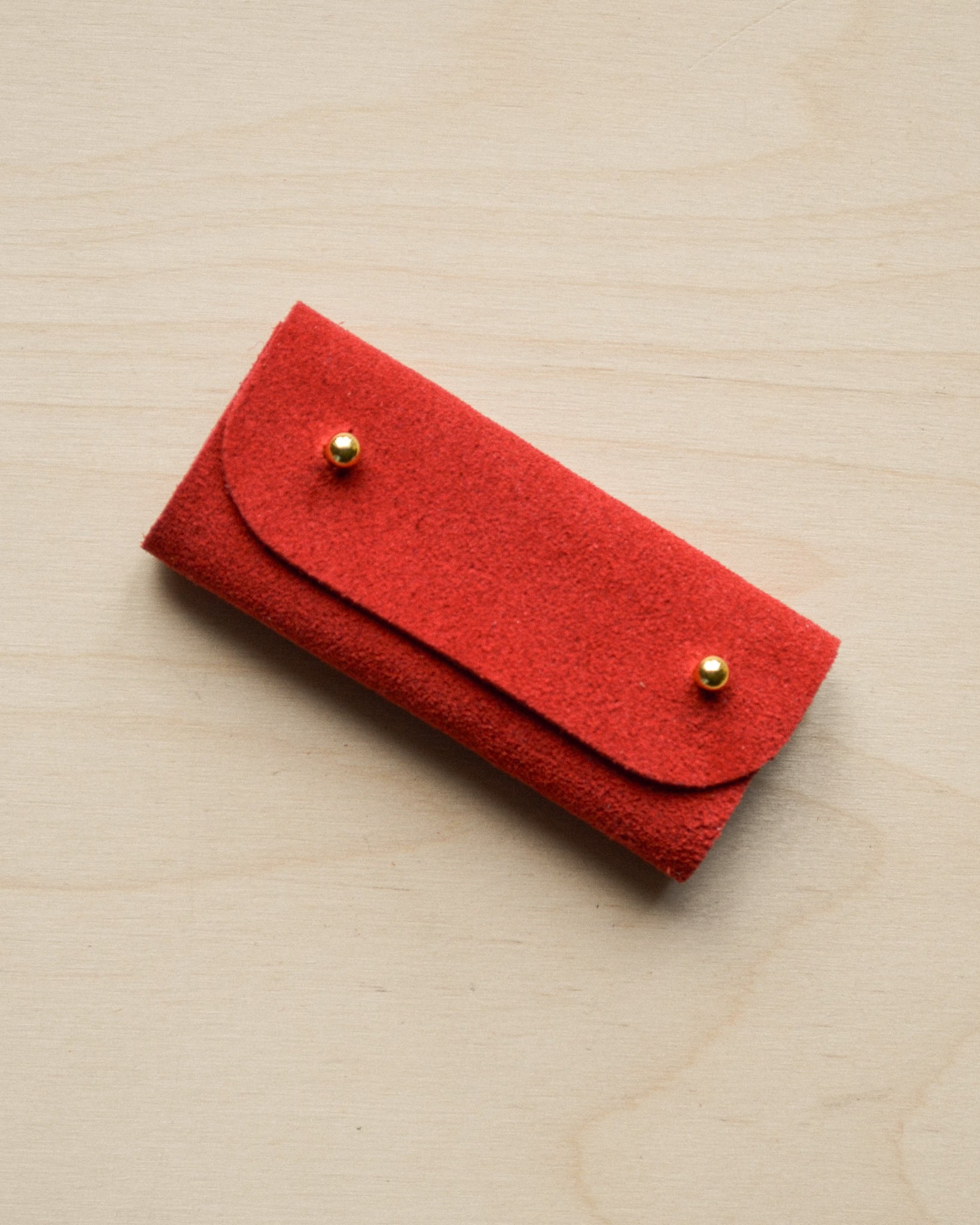 Crimson Red sewing needle case.