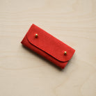 Crimson Red sewing needle case.