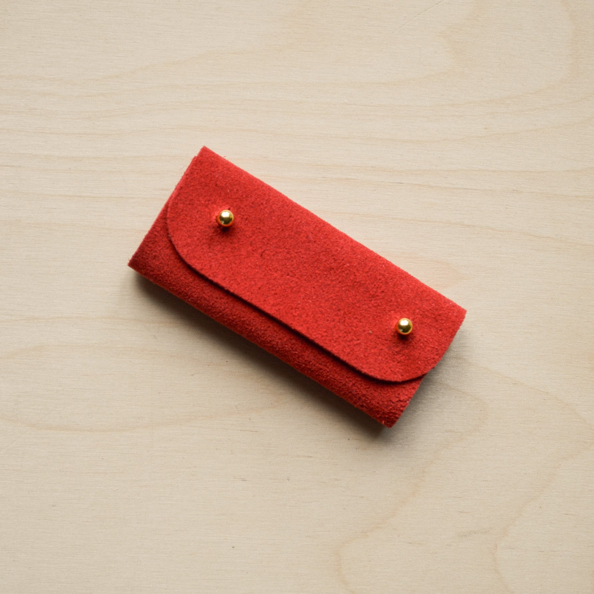 Crimson Red sewing needle case.