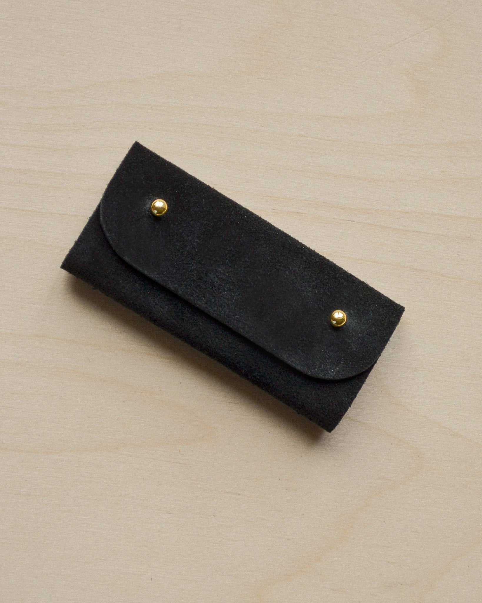 Black sewing needle case
