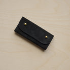 Black sewing needle case
