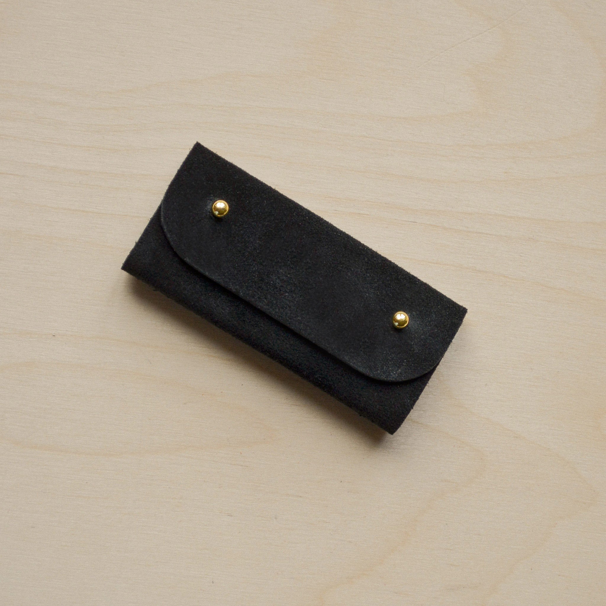 Black sewing needle case