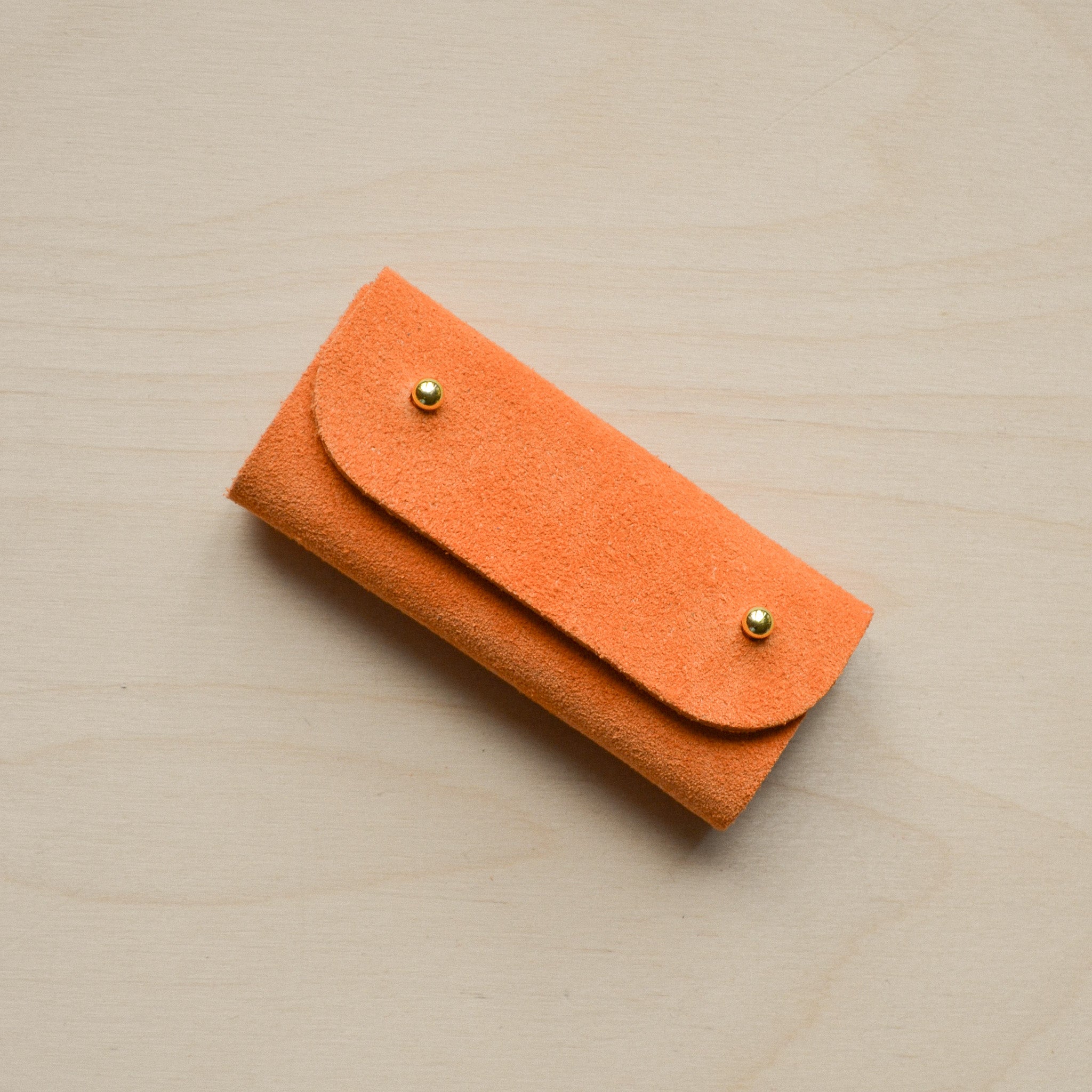 Orange sewing needle case
