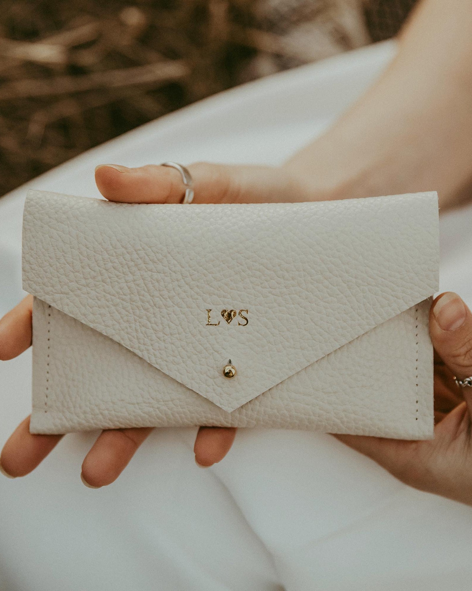 Cream Leather passport pouch that has been personalised
