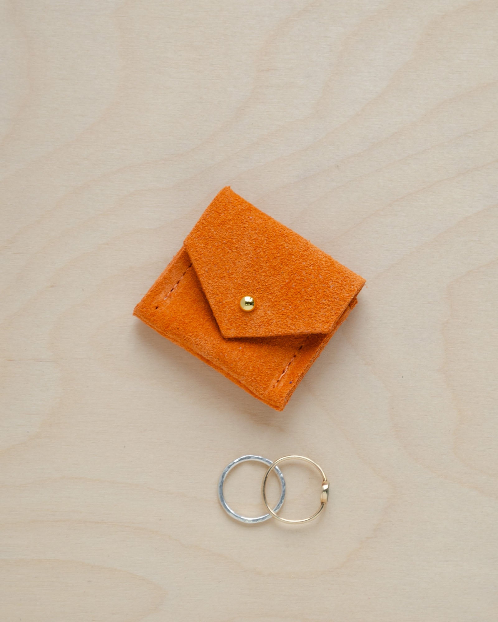 Clementine Orange Wedding Ring Pouch in suede.