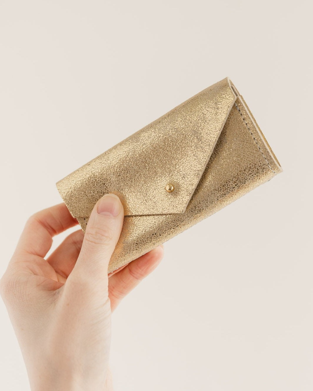 Gold sewing needle case