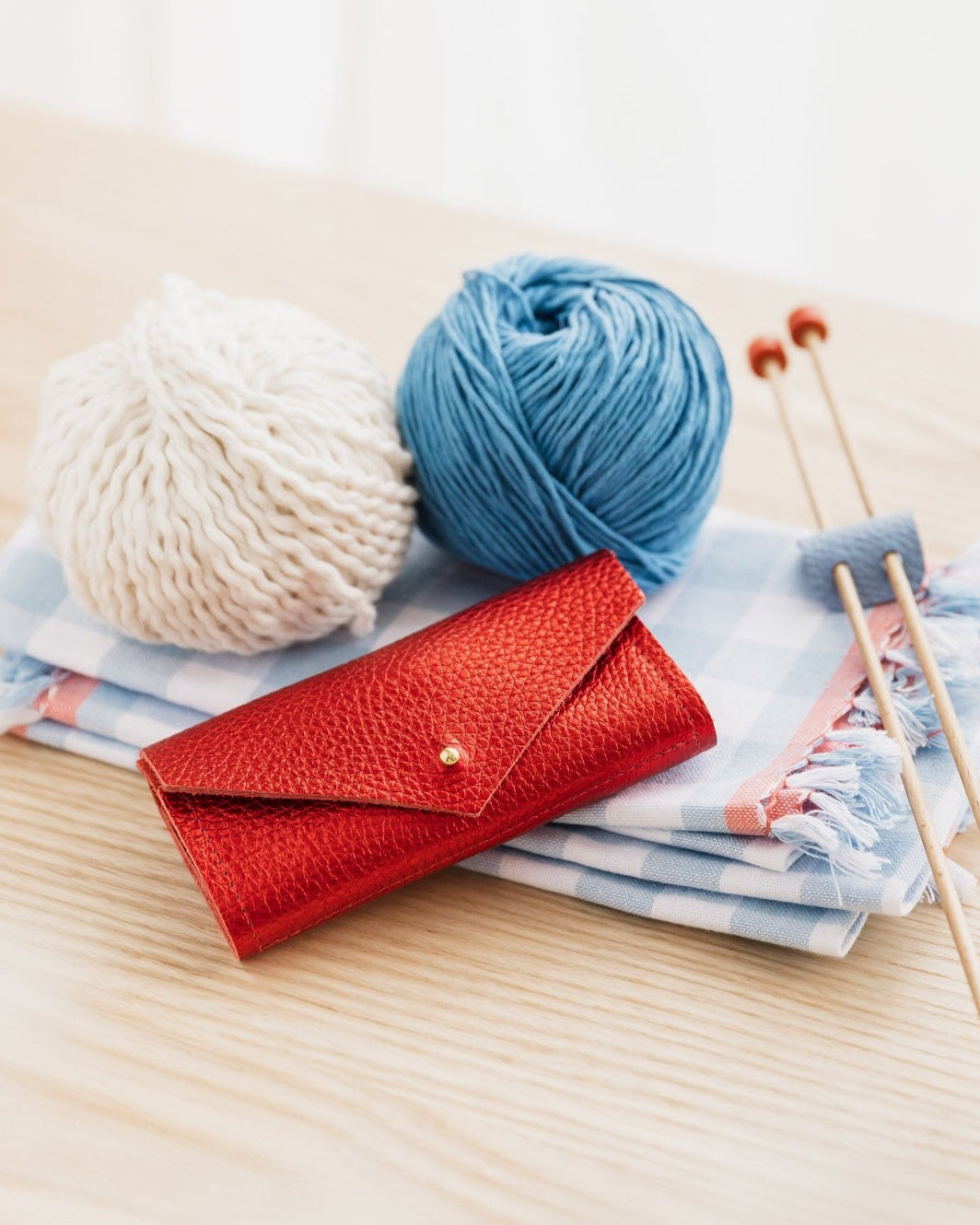 Metallic red sewing needle case