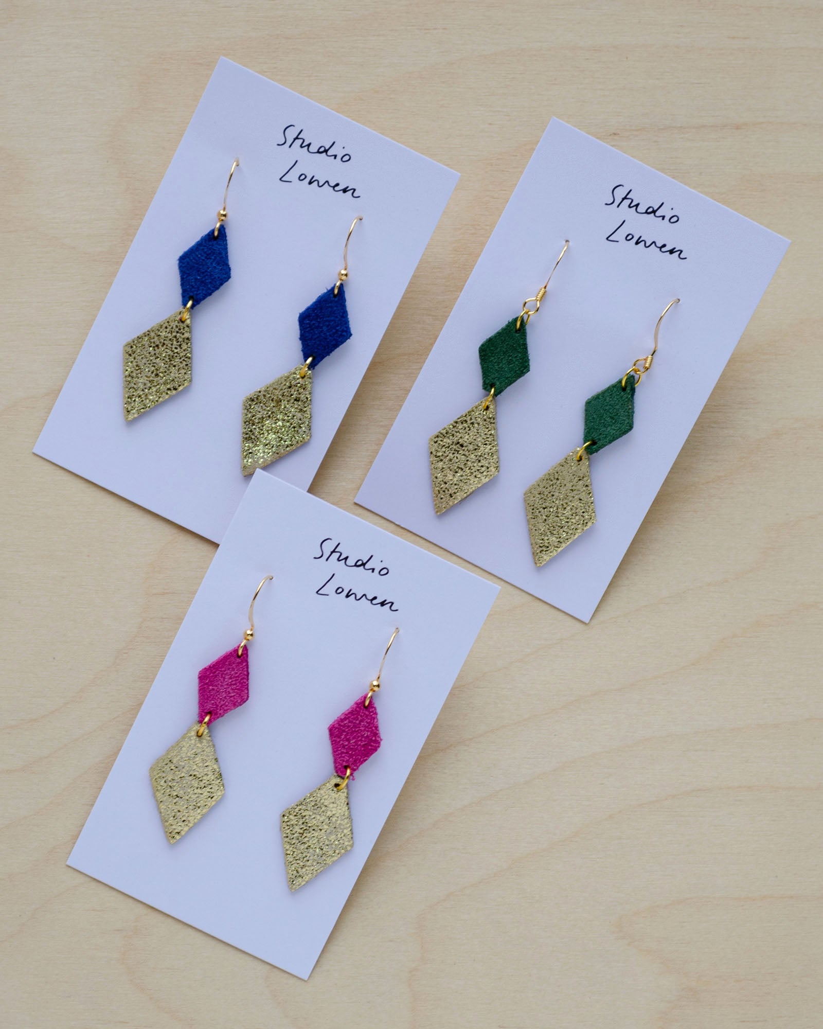 Three pairs of the Sofie Dangle Earrings in Ultramarine Blue, Moss Green, Fuchsia Pink