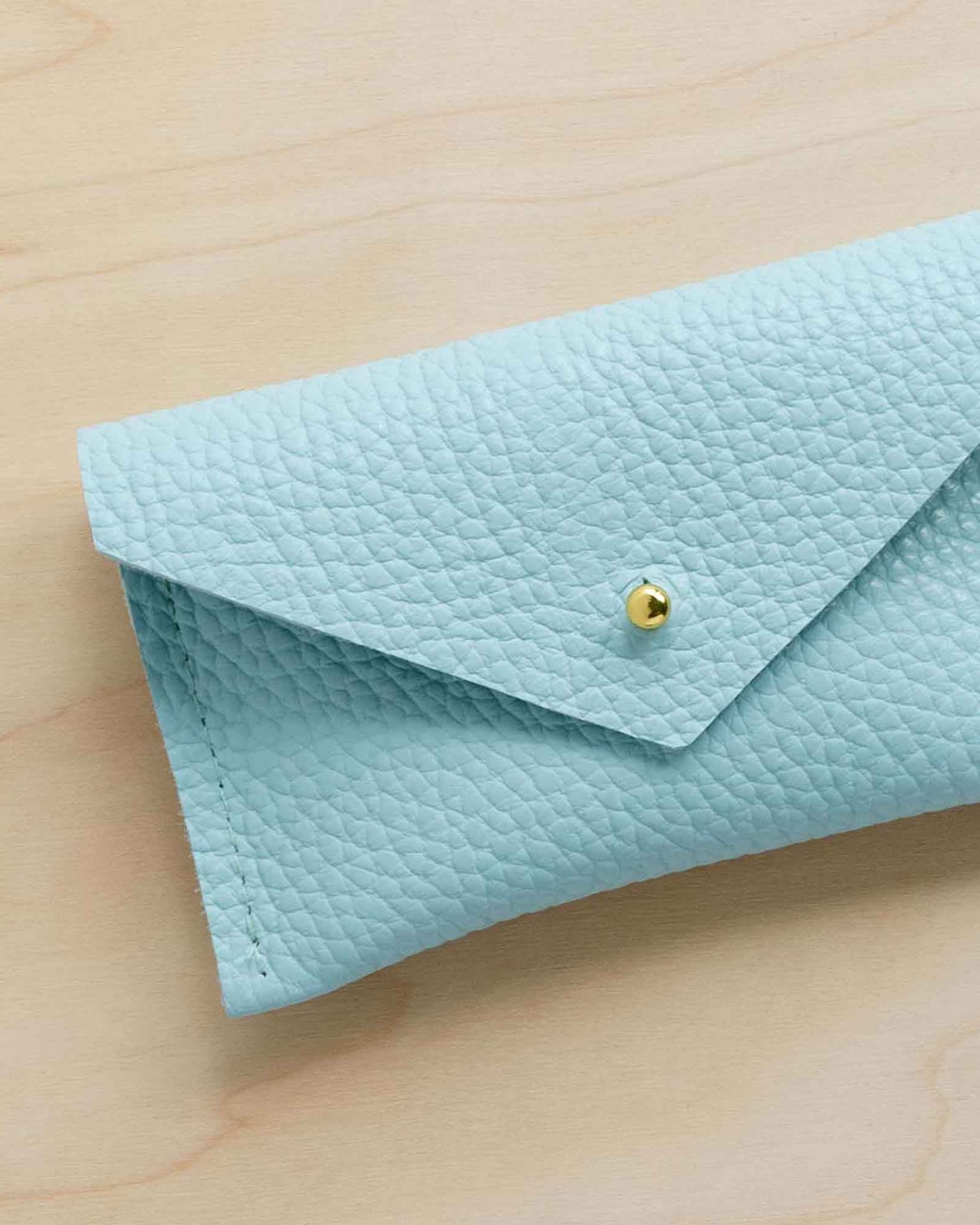 Seaglass (pale turquoise blue) leather card holder.