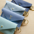 Personalised RG leather keyring holder.