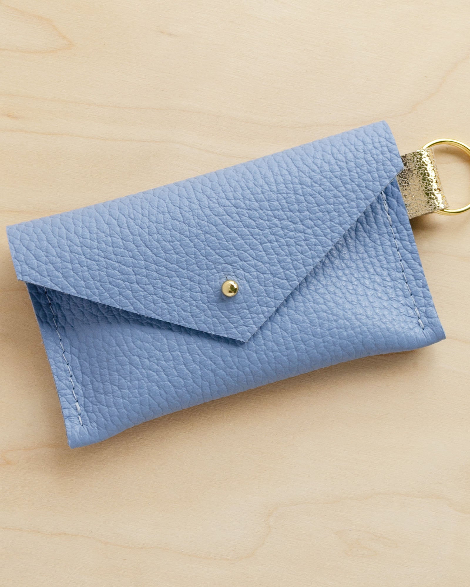 Powder blue leather keyring card holder.