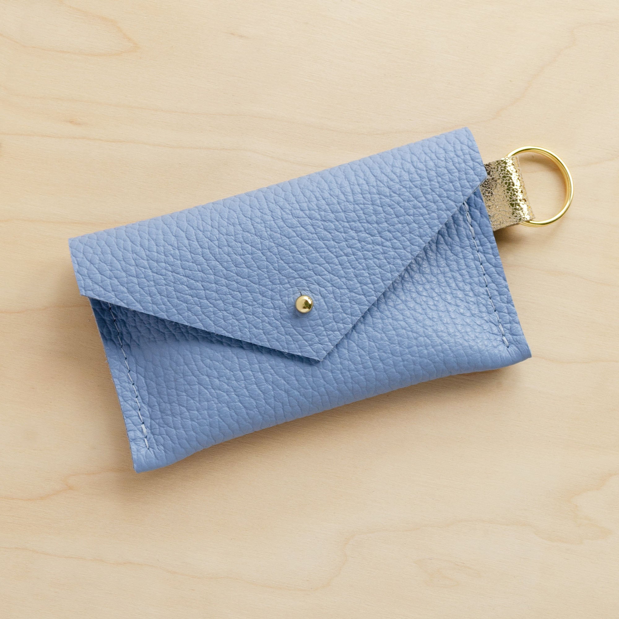 Powder blue leather keyring card holder.