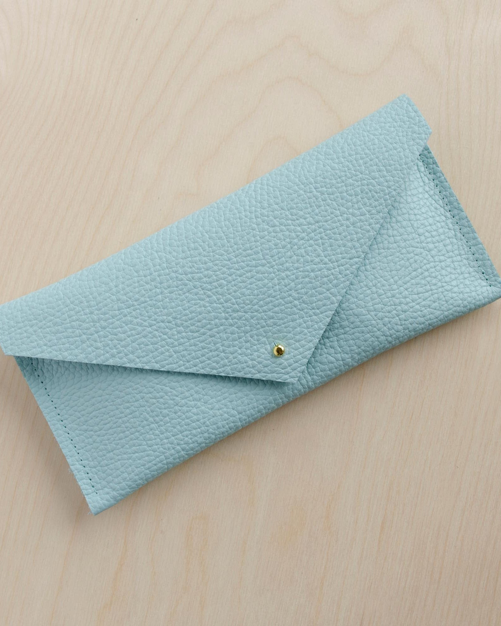 Seaglass turquoise clutch purse with envelope design.