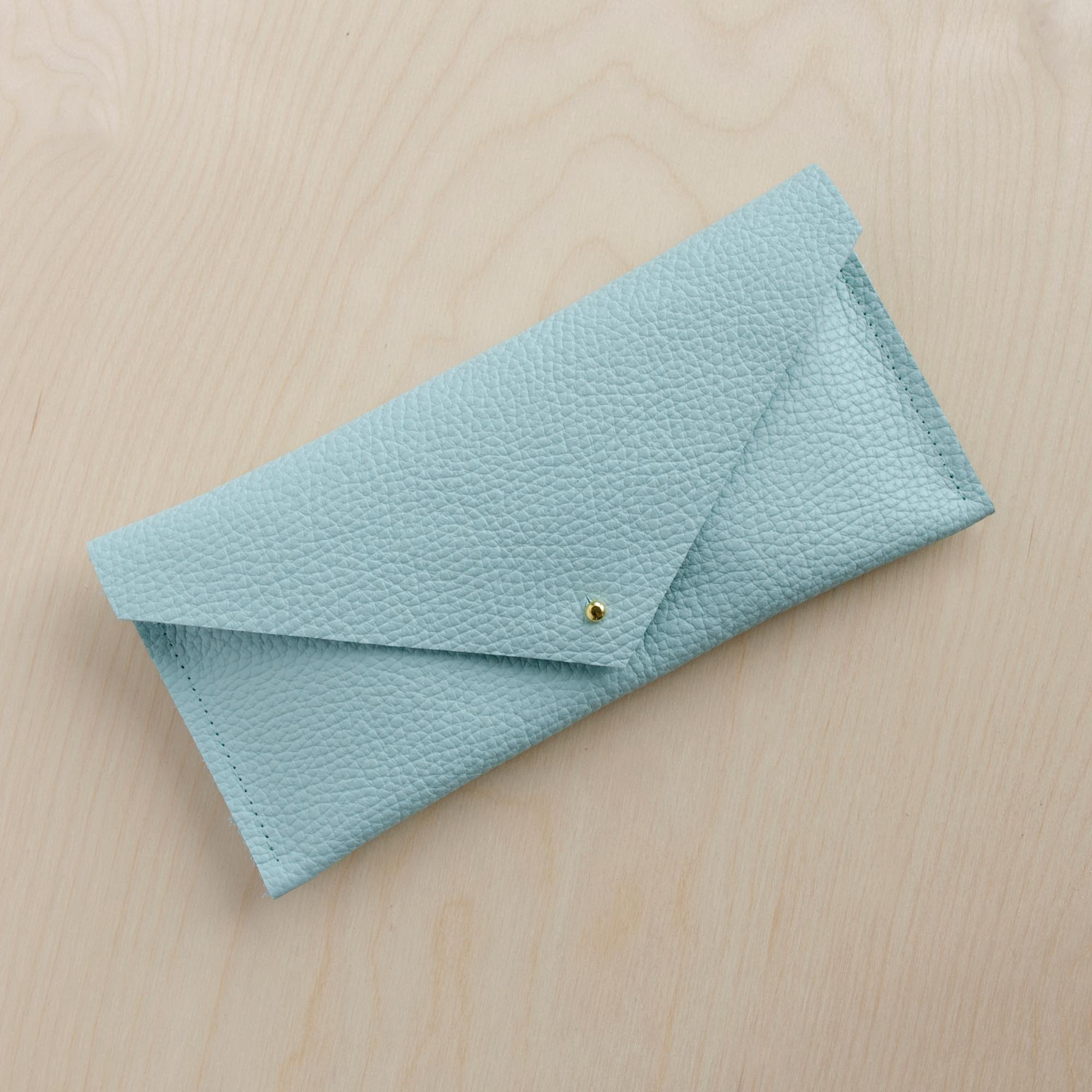 Seaglass turquoise clutch purse with envelope design.