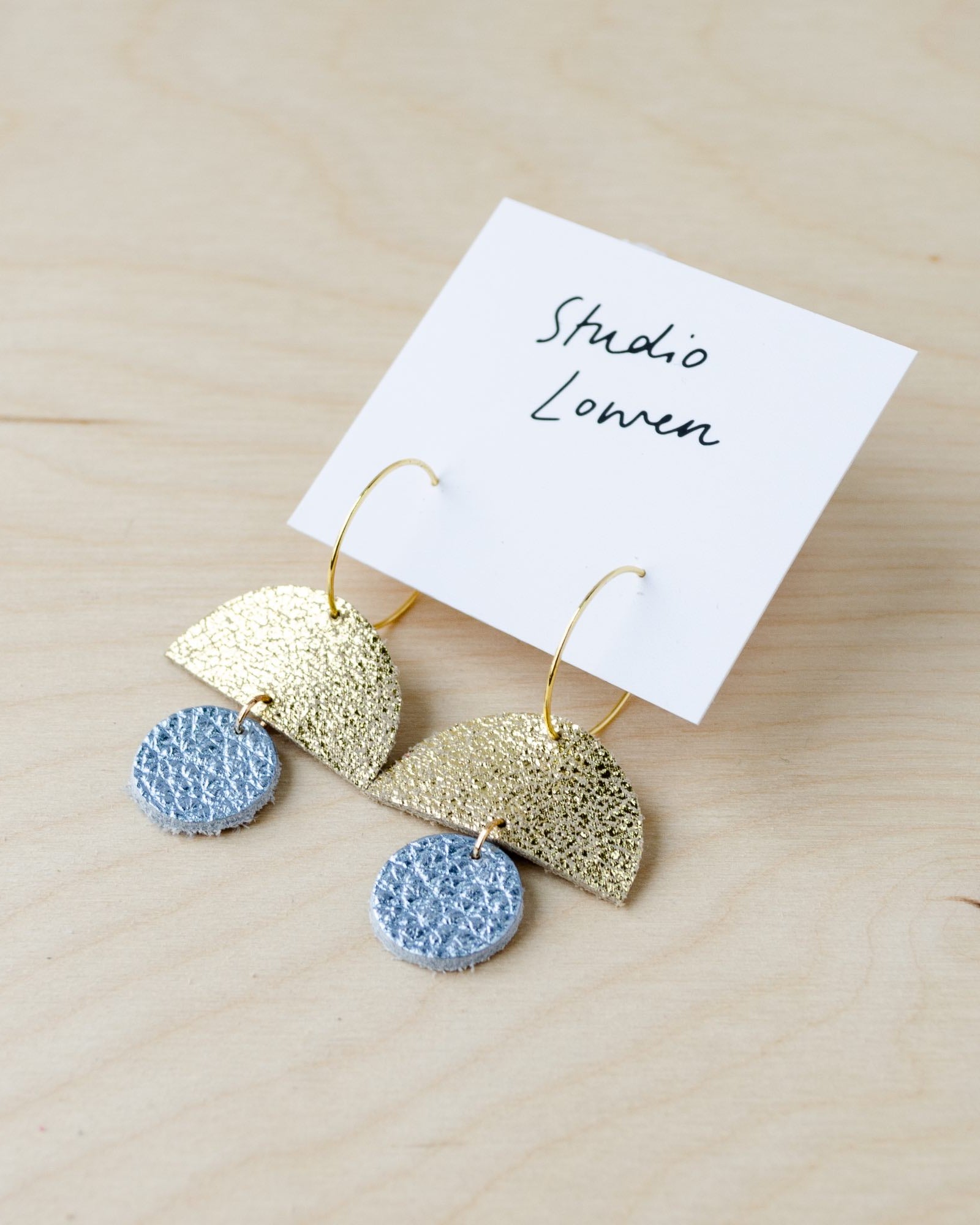 Sunrise hoops in metallic diamond leather