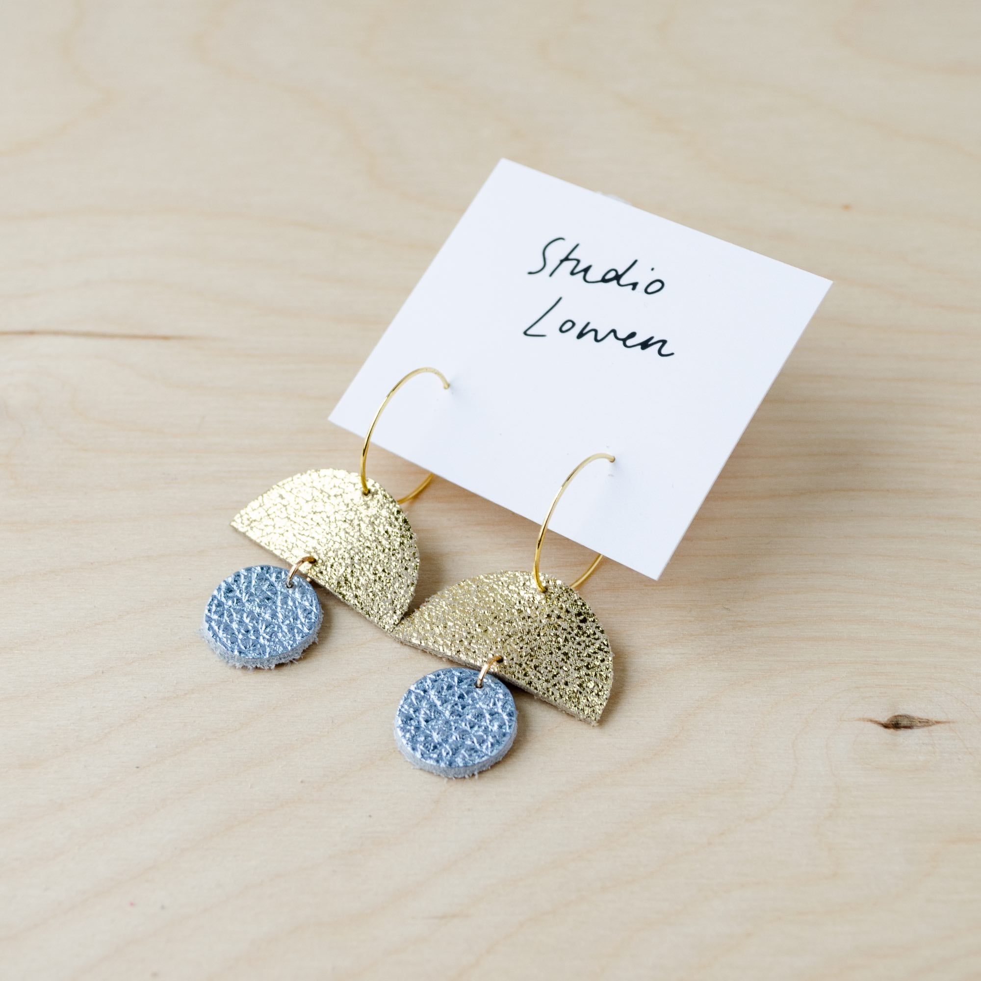 Sunrise hoops in metallic diamond leather