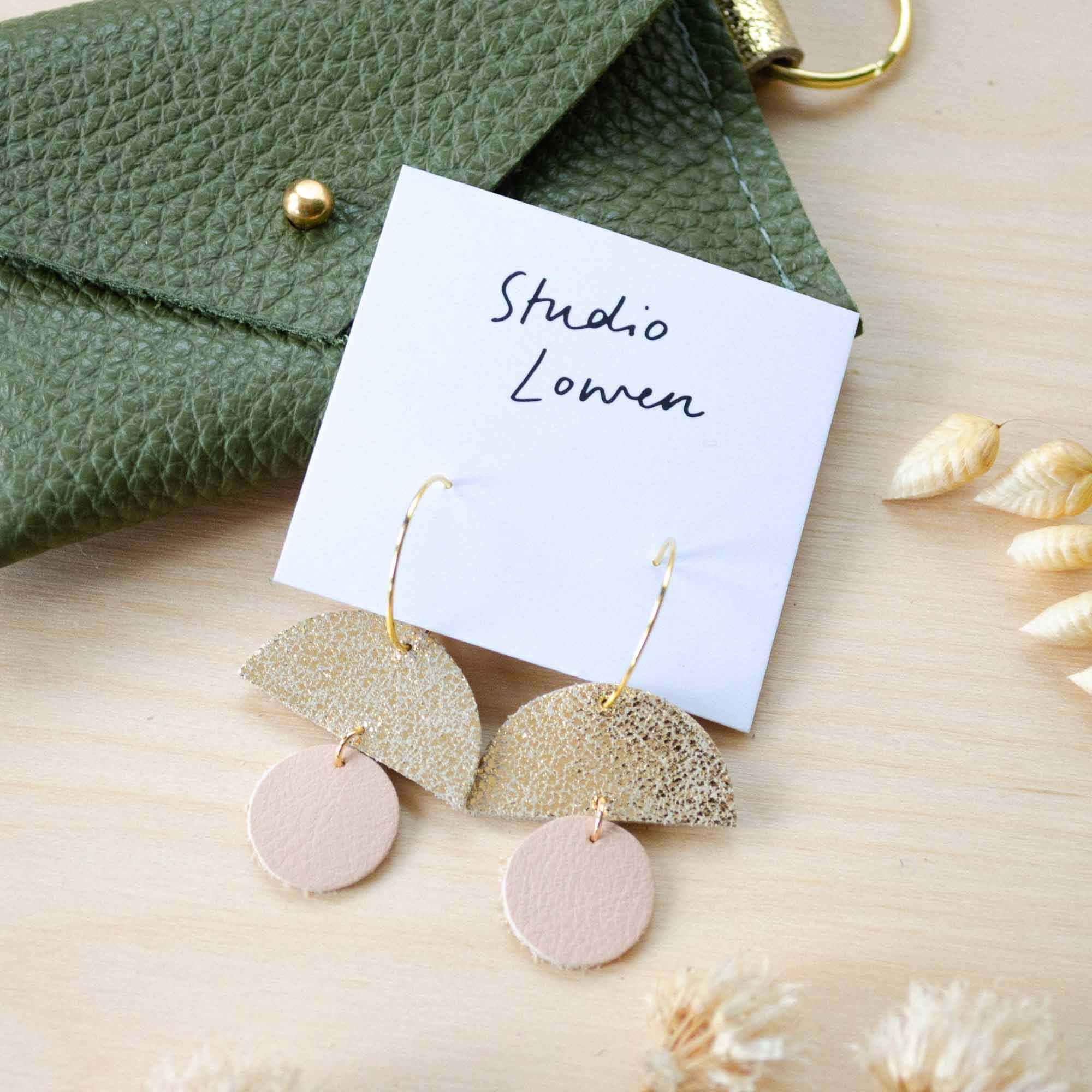 The sunrise hoops in leather in the colour nude.