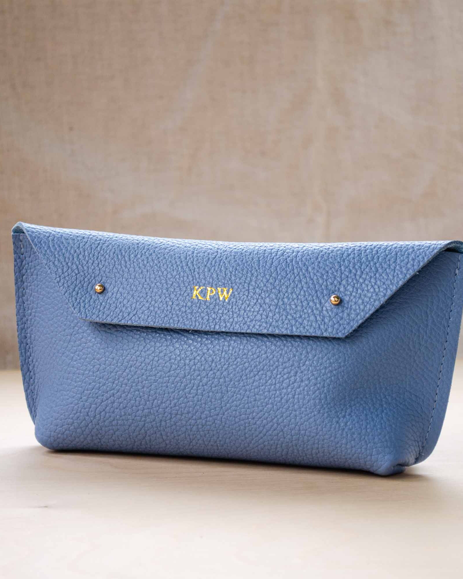 Ailla Powder Blue Leather Clutch Bag with personalisation.