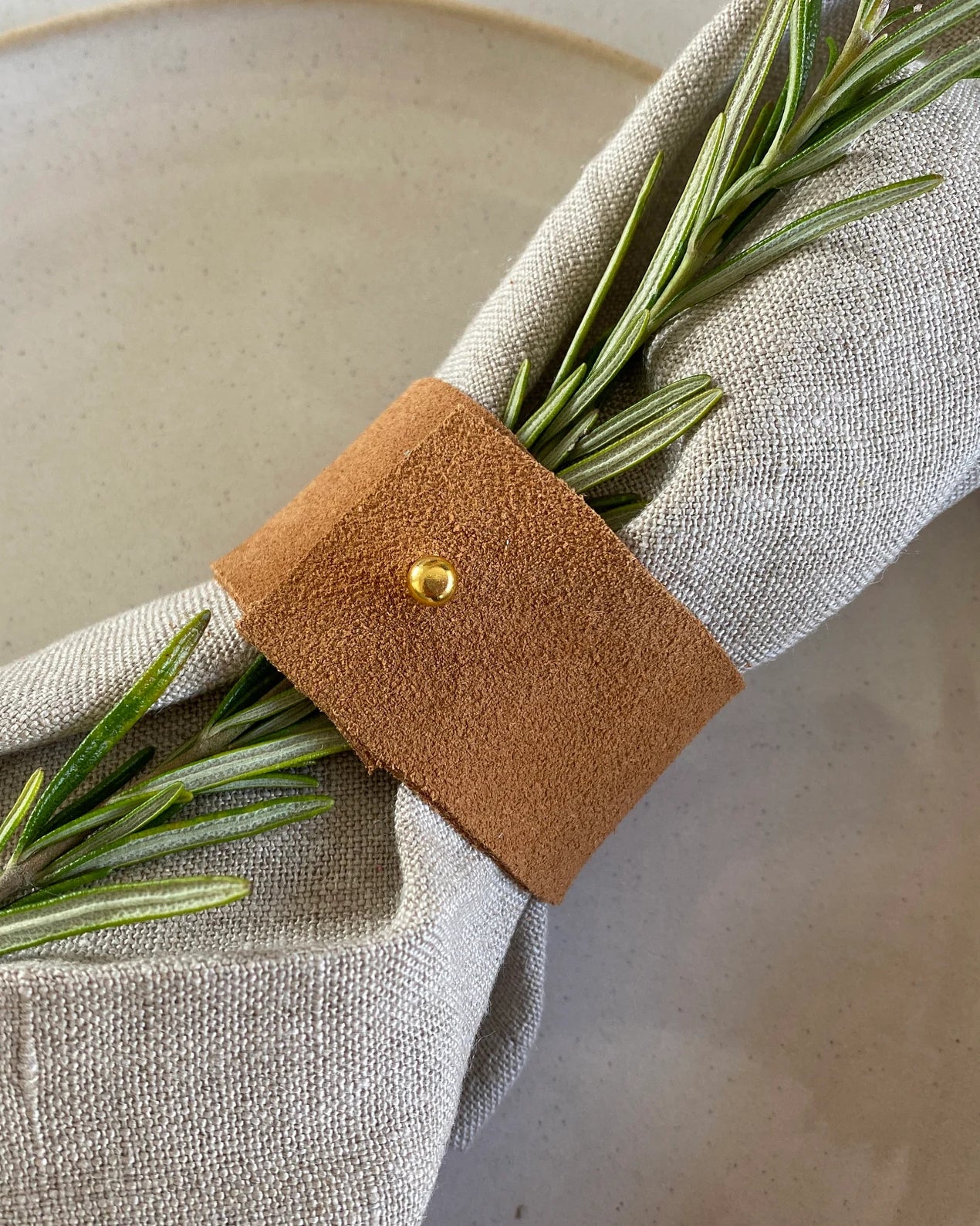Tan brown napkin ring.