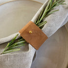 Tan brown napkin ring.