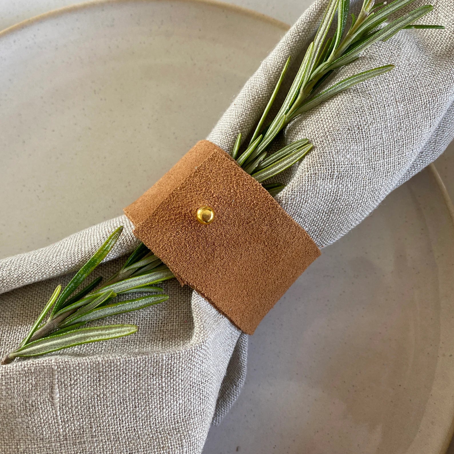 Tan brown napkin ring.