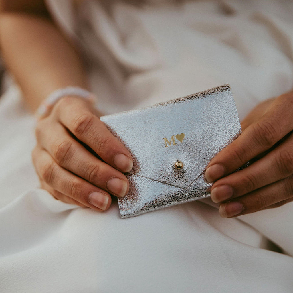Personalised silver jewellery pouch, with brides initials and a heart monogrammed on the front.